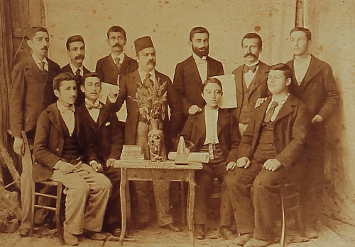 Young graduates with their teachers