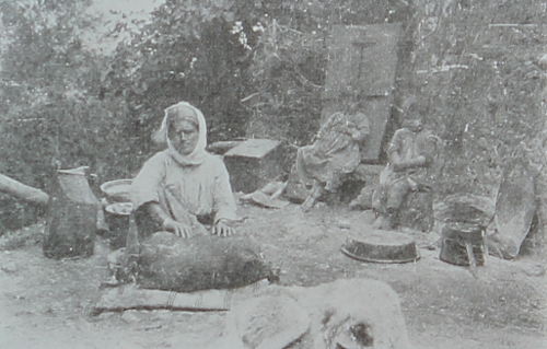 Armenian woman preparing the butter