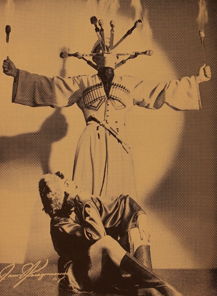 John Yervant in a Caucasian flaming sword dance with Felice watching