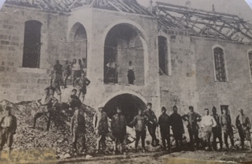 My uncle Marouke Zarmanian standing on a rock in the centre, Armenian Legion, Mersin 1920