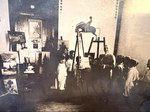 Mihran Seraylian teaching painting at the Armenian orphanage